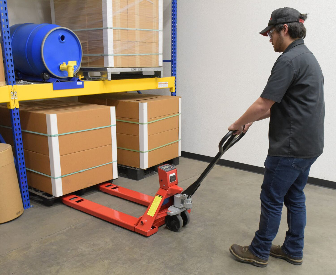 Steel Trade Legal Low Profile Pallet Truck with Scale and Printer 66 In. x 28 In. x 48 In. 5000 Lb. Capacity Red